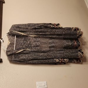 Live and let Live , Size large , black, tan, burgundy red